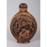 A CHINESE WOOD SNUFF BOTTLE & STOPPER, 2.75in high.