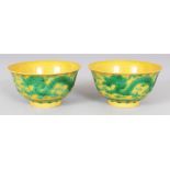A PAIR OF CHINESE GREEN & YELLOW PORCELAIN DRAGON BOWLS, each base with a Daoguang seal mark, 3.