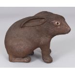 A 19TH/20TH CENTURY CHINESE SHIWAN RED POTTERY MODEL OF A RABBIT, its fur naturalistically engraved,