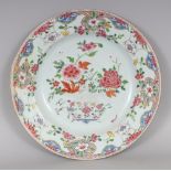 AN 18TH CENTURY CHINESE YONGZHENG/QIANLONG FAMILLE ROSE PORCELAIN DISH, circa 1730/40, painted to