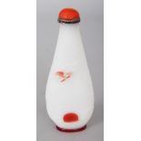 A CHINESE RED OVERLAY OPAQUE WHITE GROUND PEAR FORM MOULDED GLASS SNUFF BOTTLE & STOPPER, the side