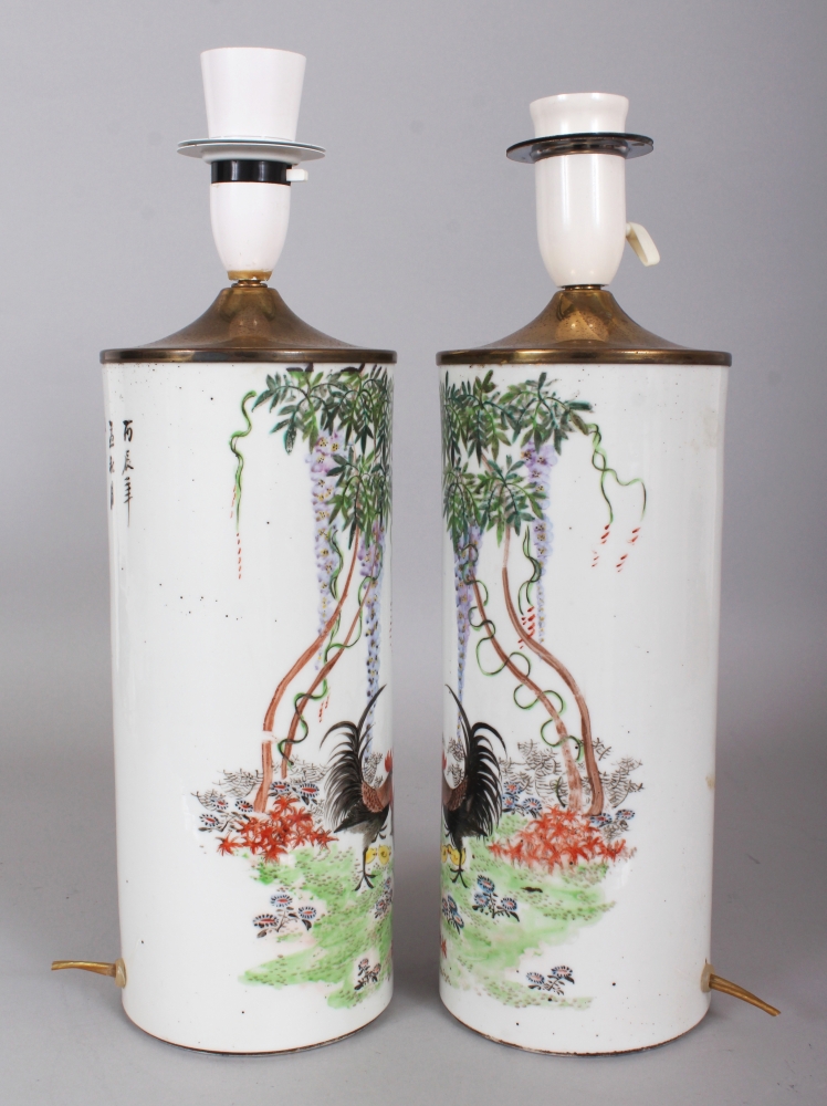 A MIRROR PAIR OF EARLY 20TH CENTURY CHINESE CYLINDRICAL PORCELAIN VASES, fitted for electricity, - Image 2 of 8