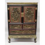 AN EARLY 20TH CENTURY CHINESE CARVED GILT WOOD CABINET, with two doors opening above two short