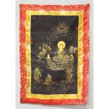 A TIBETAN SILK BORDERED THANGKA, decorated with Buddha, attendants and acolytes, the whole approx.