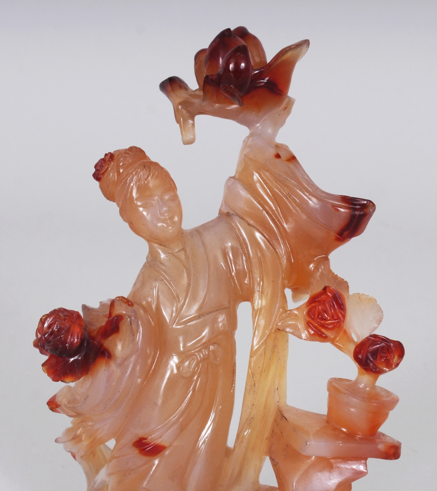 A CHINESE AGATE CARVING OF A STANDING LADY, bearing aloft a bowl of peach, 6in high. - Image 5 of 6