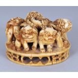 AN UNUSUAL GOOD QUALITY SIGNED JAPANESE MEIJI PERIOD IVORY OKIMONO OF A GROUP OF FIVE SHI-SHI,
