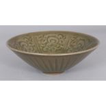 A CHINESE SONG STYLE CELADON CONICAL PORCELAIN BOWL, 5.8in diameter & 2.1in high.