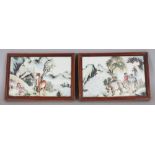 A SMALL PAIR OF GOOD QUALITY CHINESE WOOD FRAMED FAMILLE ROSE PORCELAIN PLAQUES, each decorated with