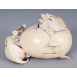 A JAPANESE MEIJI PERIOD IVORY OKIMONO BOX & COVER, in the form of a rat stalking a chick in a