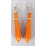 A PAIR OF GOOD QUALITY GOLD MOUNTED BUTTERSCOTCH AMBER EARRINGS, weighing in total approx 5.8gm, the