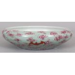 A GOOD QUALITY CHINESE FAMILLE ROSE CELADON GROUND SHALLOW PORCELAIN BRUSHWASHER, decorated with