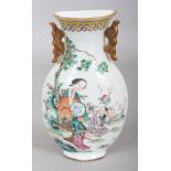 A GOOD QUALITY LATE 19TH CENTURY CHINESE FAMILLE ROSE PORCELAIN WALL VASE, painted with a seated