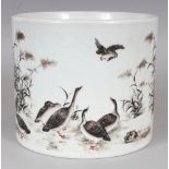 A LARGE CHINESE PORCELAIN BRUSHPOT, decorated mainly en grisaille with a continuous scene of