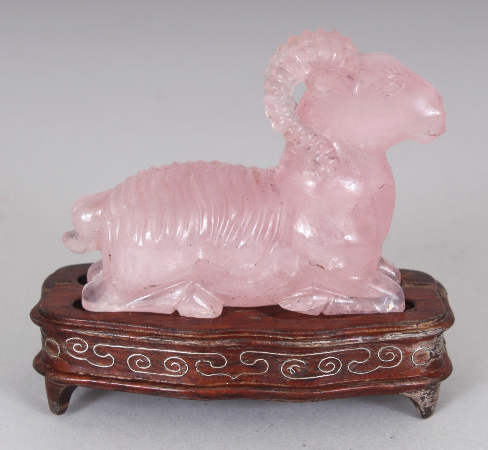 A CHINESE ROSE QUARTZ MODEL OF A RAM, together with a fitted wire-inlaid wood stand, 2.75in high - Image 3 of 7