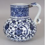 A CHINESE MING STYLE BLUE & WHITE PORCELAIN EWER, the base with a six-character Yongle mark, 6.5in