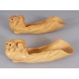 AN UNUSUAL PAIR OF SIGNED CHINESE WOODEN SPOONS, respectively carved in the form of a dog and of a