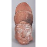 A GOOD LARGE CHINESE MING DYNASTY SANDSTONE CARVING OF AN OFFICIAL’S HEAD, the features well