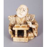 A SIGNED JAPANESE MEIJI PERIOD IVORY NETSUKE OF A SEATED SAMURAI, his face grimacing above an open