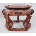 A GOOD QUALITY 19TH/20TH CENTURY CHINESE CARVED HARDWOOD STAND, with a lotus and cloud scroll