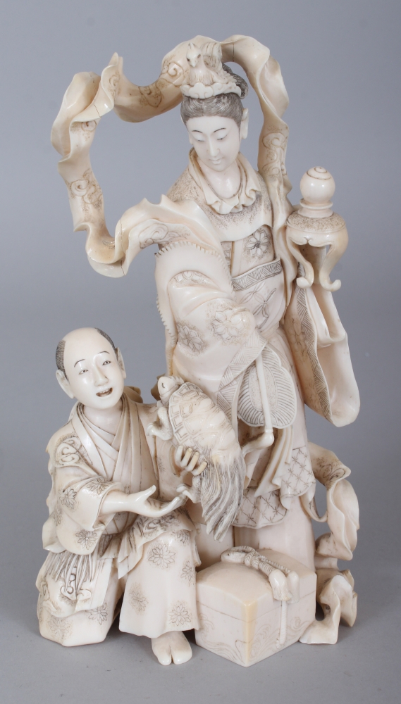 A FINE QUALITY SIGNED JAPANESE MEIJI PERIOD IVORY OKIMONO OF KWANNON, in the company of a kneeling