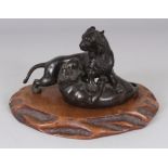 A GOOD QUALITY SIGNED JAPANESE MEIJI PERIOD BRONZE MODEL OF TWO FIGHTING TIGERS, together with a