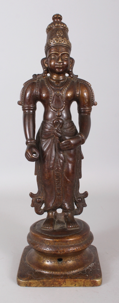 A LARGE 20TH CENTURY INDIAN BRONZE FIGURE OF RAMA, standing on a circular stepped plinth, 17in