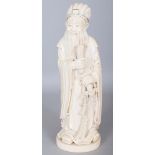 A GOOD LARGE EARLY 20TH CENTURY CHINESE CARVED IVORY FIGURE OF A STANDING WARRIOR SAGE, weighing