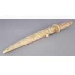 A FINE QUALITY JAPANESE MEIJI PERIOD SECTIONAL IVORY TANTO, with a steel blade, the ivory sheath