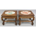 A GOOD PAIR OF 19TH CENTURY CHINESE PORCELAIN INSET HARDWOOD LOW TABLES, each carved table inset