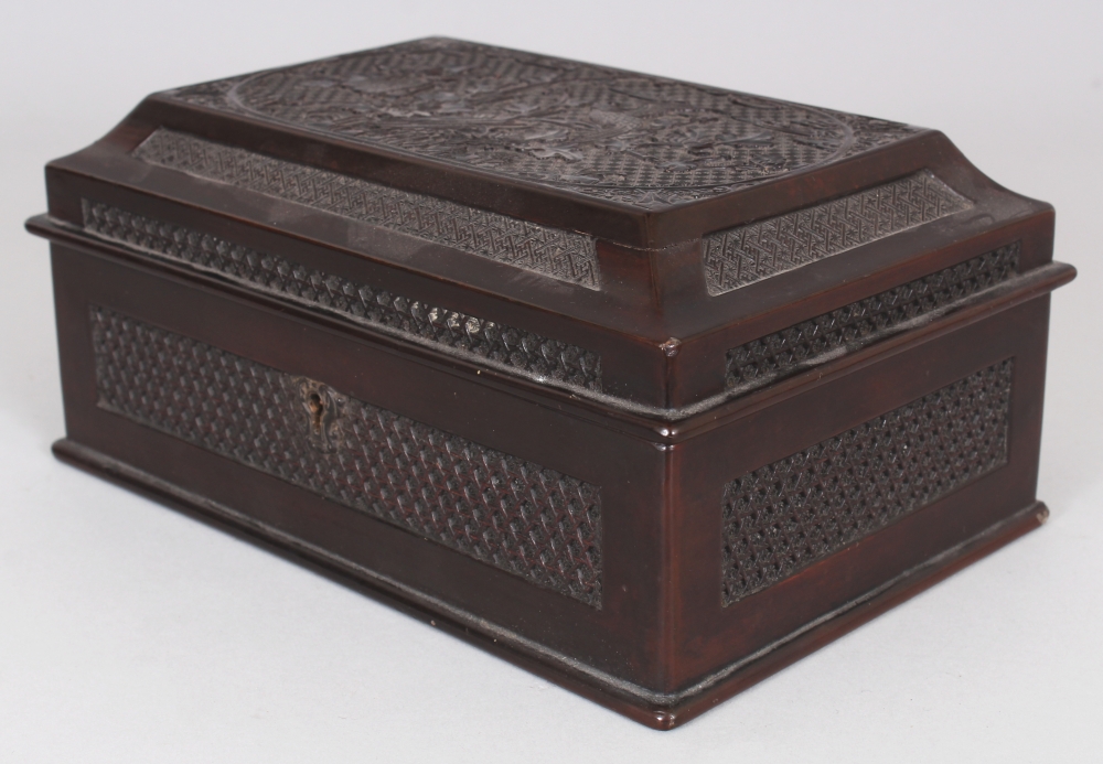 A GOOD QUALITY 19TH CENTURY CHINESE WOOD & PEWTER CASKET TEA CADDY, the hinged wood cover finely