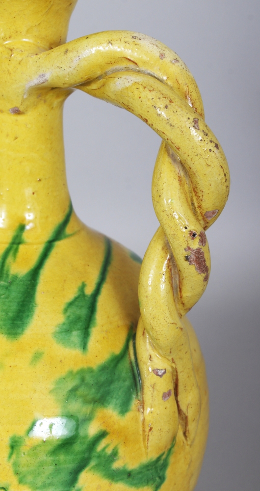 A GOOD 19TH CENTURY OTTOMAN CHANNAKALE GLAZED POTTERY EWER, decorated with splashes of green on a - Image 6 of 8