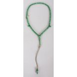 A GOOD QUALITY CHINESE JADE-LIKE GREEN HARDSTONE NECKLACE, with a slender vase-form pendant, approx.