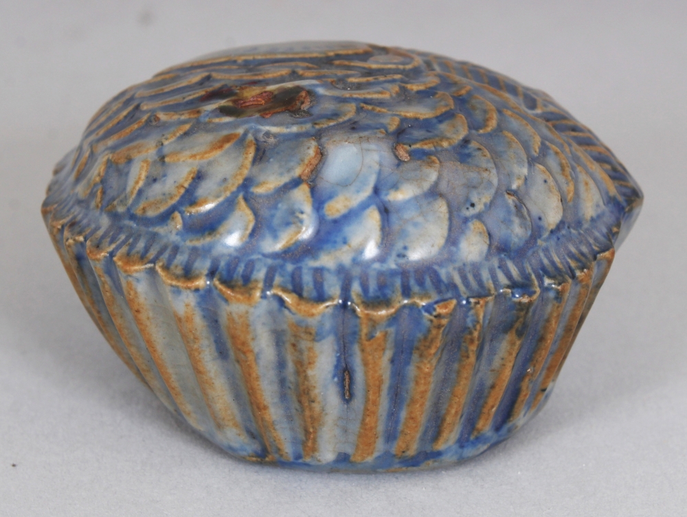 AN UNUSUAL 19TH CENTURY BLUE GLAZED MOULDED PORCELAIN WATERDROPPER, possibly Korean, 2.5in wide at