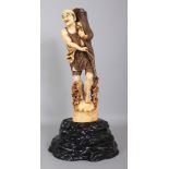 A LARGE FINE QUALITY SIGNED JAPANESE MEIJI PERIOD IVORY OKIMONO OF A FISHERMAN, weighing approx. 4.