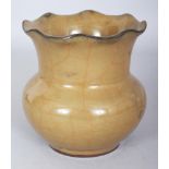 AN UNUSUAL CHINESE GUAN GLAZED ZHADOU CRACKLEGLAZE PORCELAIN VASE, with a frilled-edge neck, 4.8in