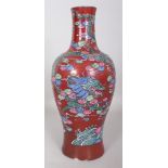 A RARE 18TH CENTURY CHINESE QIANLONG PERIOD FAMILLE ROSE LIVER RED GROUND PORCELAIN DRAGON VASE, the