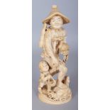 A GOOD SIGNED JAPANESE MEIJI PERIOD IVORY OKIMONO OF A CORMORANT FISHERMAN, in the company of his