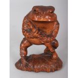 A FINE QUALITY JAPANESE MEIJI PERIOD BOXWOOD CARVING OF A TOAD, unsigned, standing on lotus on its