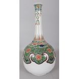 A LARGE CHINESE KANGXI PERIOD FAMILLE VERTE PORCELAIN BOTTLE VASE, the shoulders painted with a ruyi