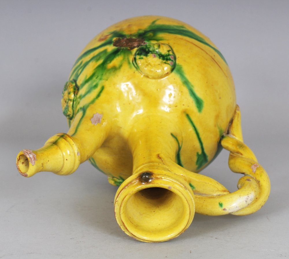 A GOOD 19TH CENTURY OTTOMAN CHANNAKALE GLAZED POTTERY EWER, decorated with splashes of green on a - Image 7 of 8
