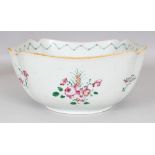 AN 18TH CENTURY CHINESE QIANLONG PERIOD FAMILLE ROSE PORCELAIN BOWL, of rounded square form with