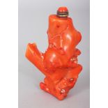 A CHINESE RED CORAL SNUFF BOTTLE & STOPPER, 2.9in high overall.