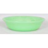 A 19TH/20TH CENTURY CHINESE LIME GREEN BEIJING GLASS BOWL, 7.8in diameter & 1.8in high.