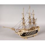 A NAPOLEONIC PRISONER OF WAR BONE THREE MASTED SHIP. 15ins long x 13ins high.