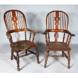 A VERY NEAR SET OF SIX YEW WOOD TALL BACK BROAD ARMCHAIRS. (Two Illustrated).