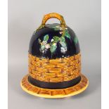 A MAJOLICA BEEHIVE SHAPED STILTON CHEESE DISH AND STAND.