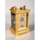 A GOOD FRENCH CARRIAGE CLOCK with repeat and alarm, Retailed by CAMERDEN & FORSTER, NEW YORK. 6.5ins