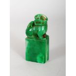 A CHINESE JADE FOO DOG SEAL. 2.5ins high.