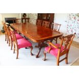 A GOOD GEORGE III DESIGN MAHOGANY AND CROSSBANDED TWIN PILLAR EXTENDING DINING TABLE, with two