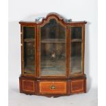 A MINIATURE DUTCH INLAID VITRINE, with shaped top, glass door with glass sides, over a single